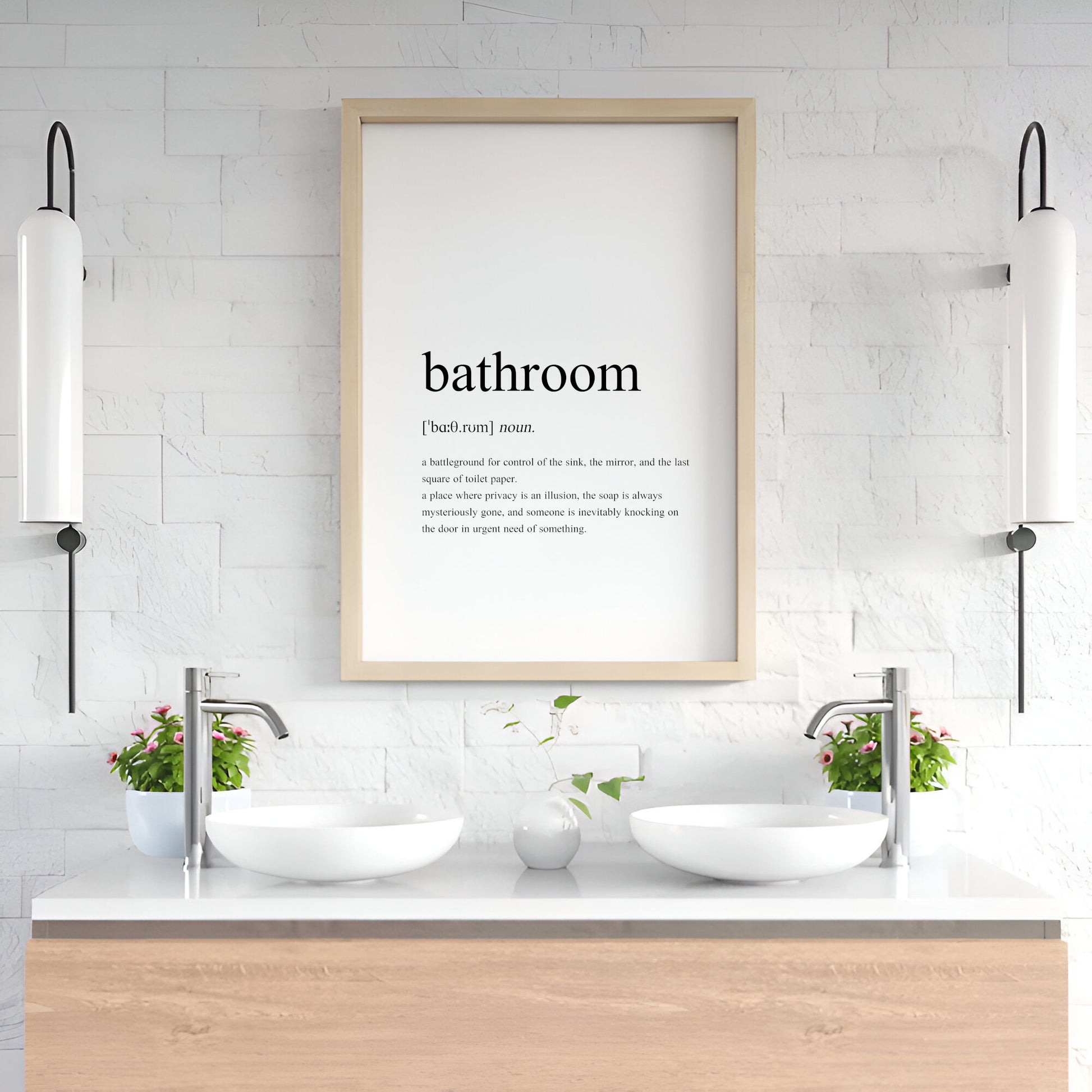 Single portrait typography print featuring a dictionary-style definition of the word bathroom. The word itself, together with its phonetic pronunciation, type and definition are included. Text is in a lower case serif font, black on a white background and left-aligned.