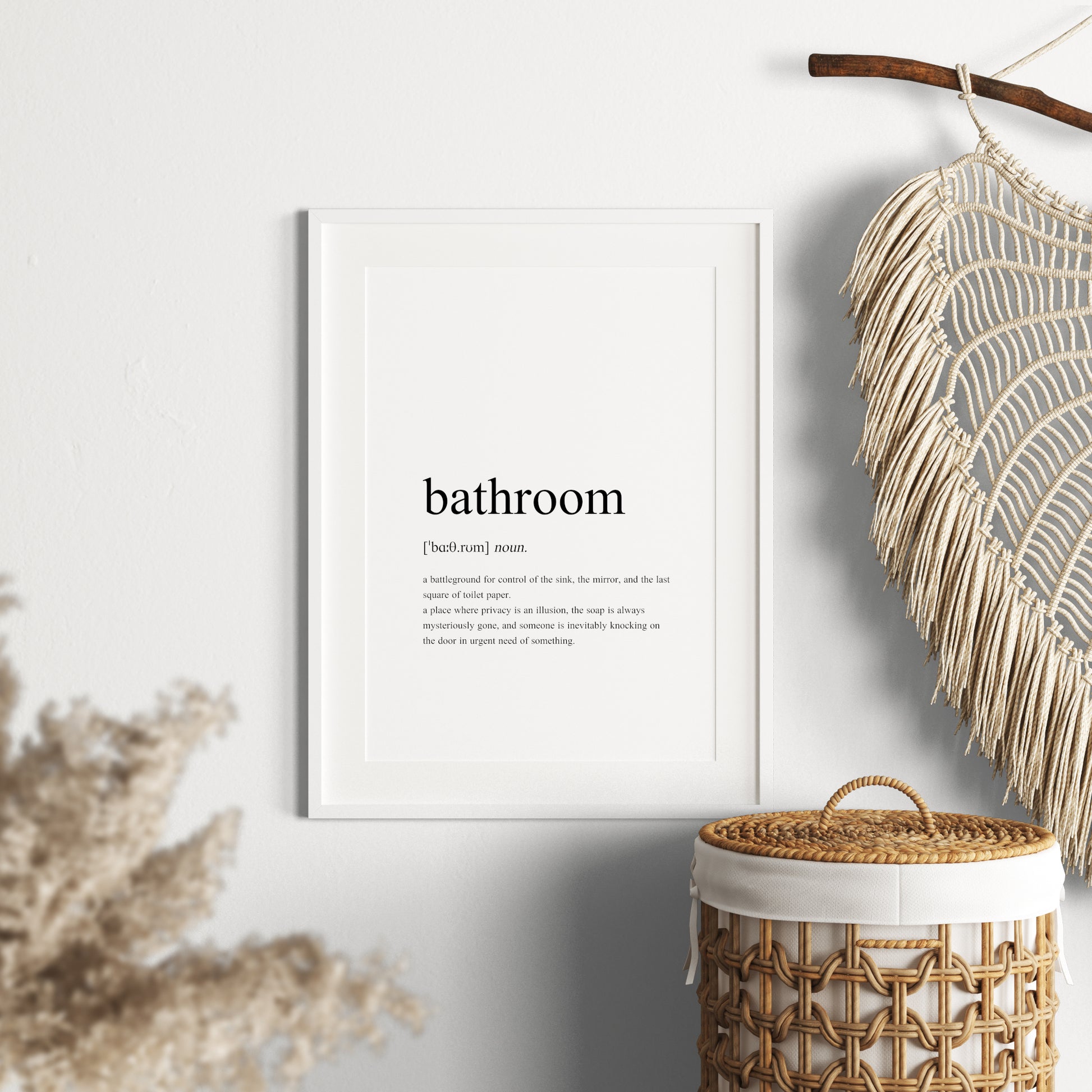 Single portrait typography print featuring a dictionary-style definition of the word bathroom. The word itself, together with its phonetic pronunciation, type and definition are included. Text is in a lower case serif font, black on a white background and left-aligned.