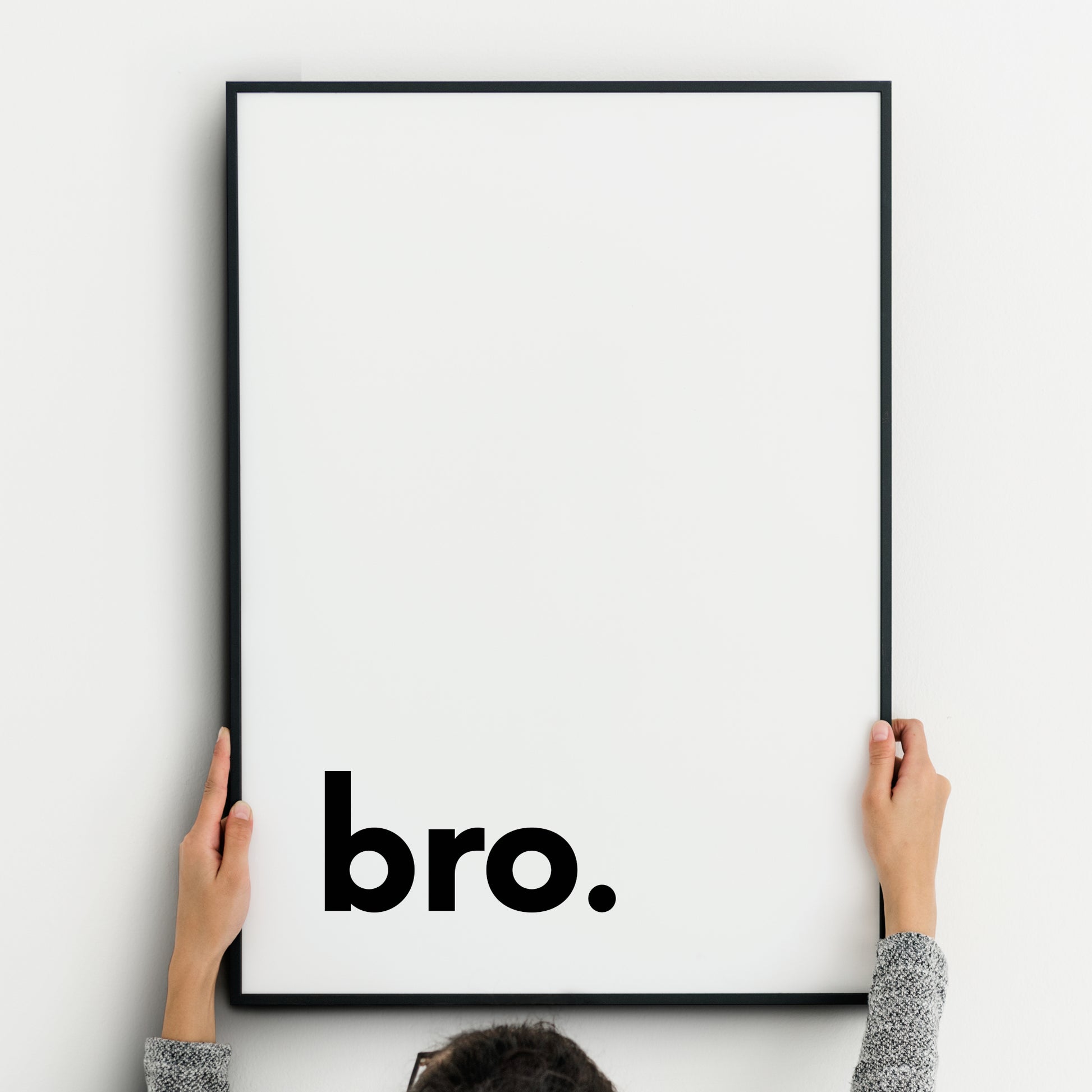 Single portrait typography print. Text reads "bro.", in a bold lower case sans serif font, positioned to the bottom left. Text is black on a white background. Styling is modern and minimalist.