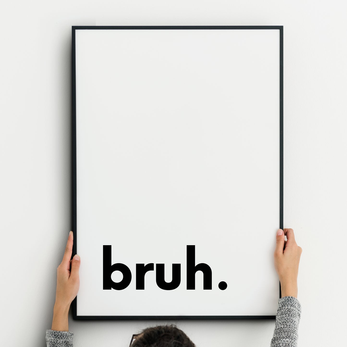 Single portrait typography print. Text reads "bruh.", in a bold lower case sans serif font, positioned to the bottom left. Text is black on a white background. Styling is modern and minimalist.