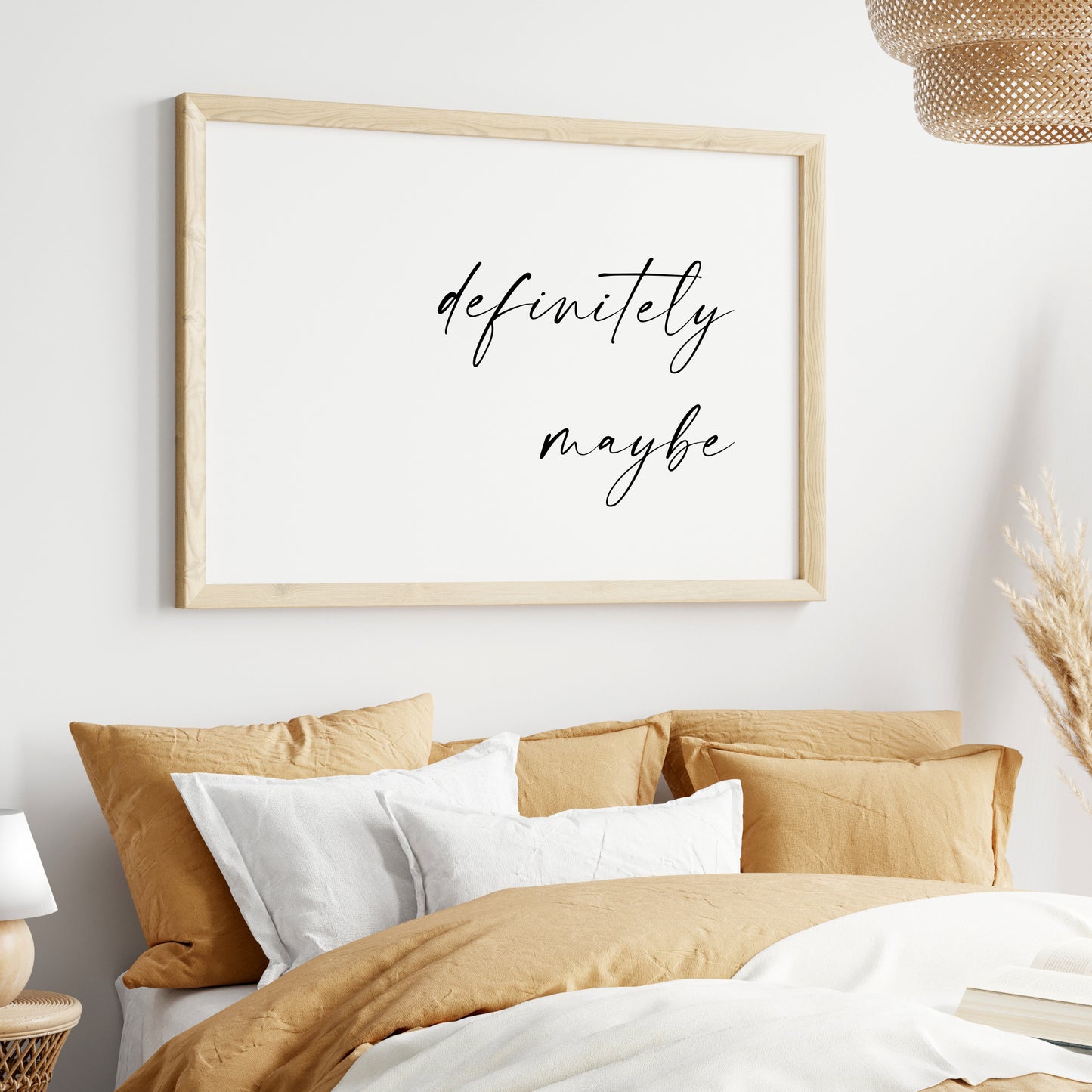Single landscape typography print. Text reads: definitely maybe. Text is in a modern script font, split across two rows. Text is black on a white background and right-aligned. Styling is elegant and contemporary.
