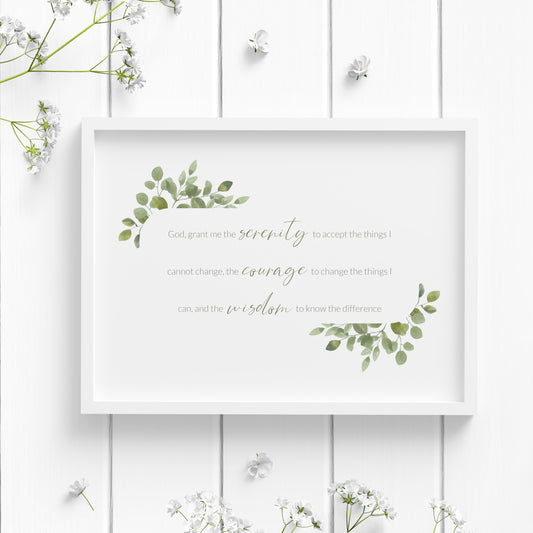 Single landscape print of the Serenity Prayer. Text reads: Grant me the serenity to accept the things I cannot change, the courage to change the things I can, and the wisdom to know the difference. Text is green and framed by eucalyptus leaves.