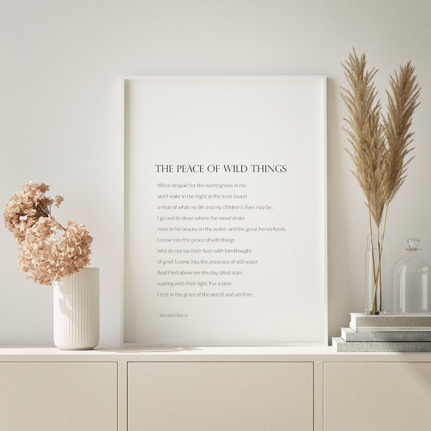 Single portrait typography print featuring the poem The Peace Of Wild Things by Wendell Berry. Title is on a formal upper case serif font. Bodt text and attribution are in a lightweight sans serif font. Text is left-aligned and black on a white background. Styling is minimalist and elegant.