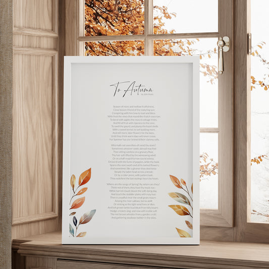 Single portrait print featuring the poem To Autumn by John Keats. The title is in a modern script font with the body text is a lightweight sans serif font. All text is black on a white background and centre-aligned. The print is embellished with a watercolour illustration of autumn leaves, which frame the poem to the bottom left and right. Styling is modern and elegant.