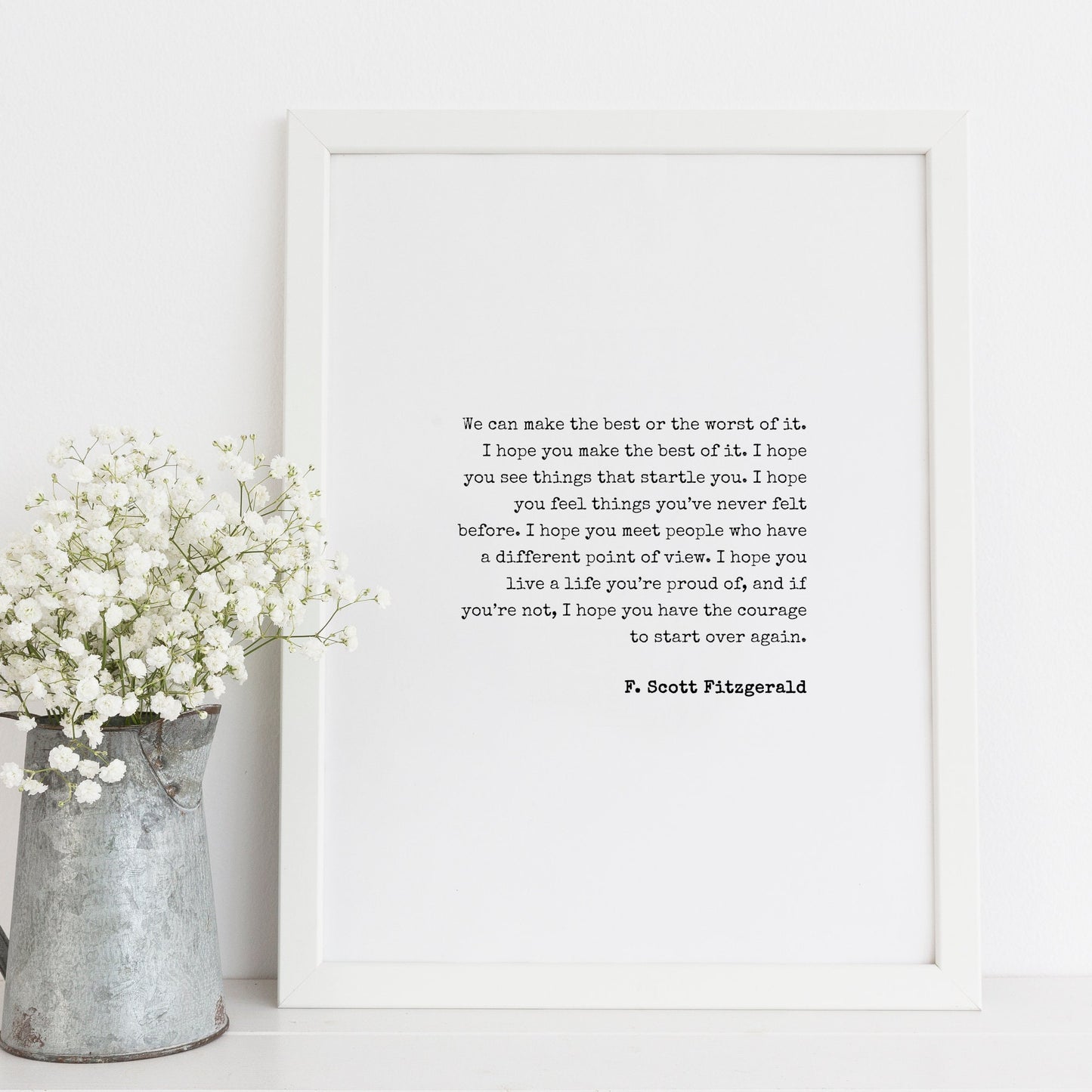 Single portrait typography print featuring the iconic quote from F. Scott Fitzgerald beginning "We can make the best or the worst of it". Text is black on a white background and in a vintage typewriter-style font.