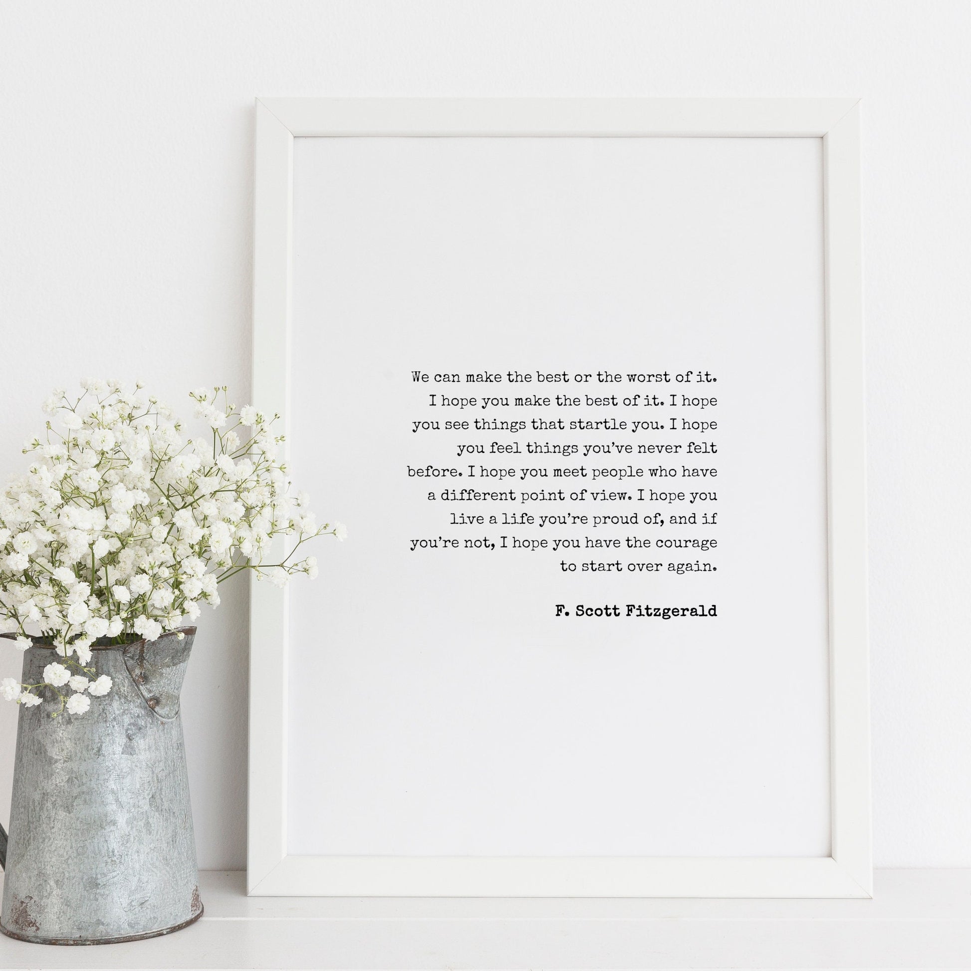 Single portrait typography print featuring the iconic quote from F. Scott Fitzgerald beginning "We can make the best or the worst of it". Text is black on a white background and in a vintage typewriter-style font.