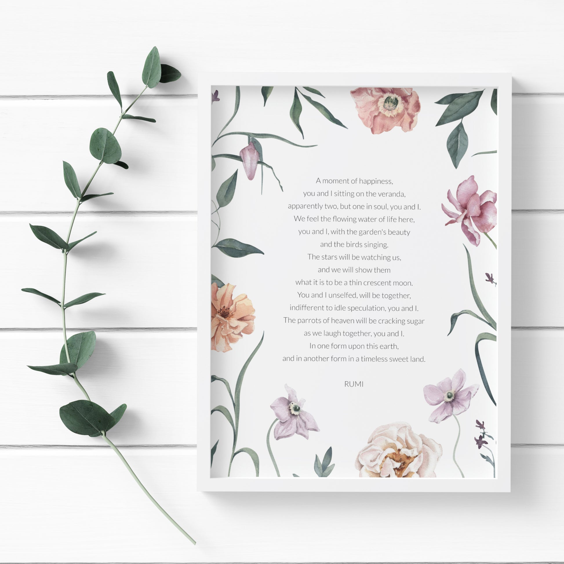 Single illustrated portrait print featuring the poem A Moment Of Happiness by Rumi. The poem and attribution are in a lightweight sans serif font, black on a white background and centre-aligned. The print is illustrated with a watercolor floral border. The styling is elegant and delicate.