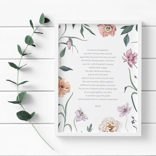 Single illustrated portrait print featuring the poem A Moment Of Happiness by Rumi. The poem and attribution are in a lightweight sans serif font, black on a white background and centre-aligned. The print is illustrated with a watercolor floral border. The styling is elegant and delicate.