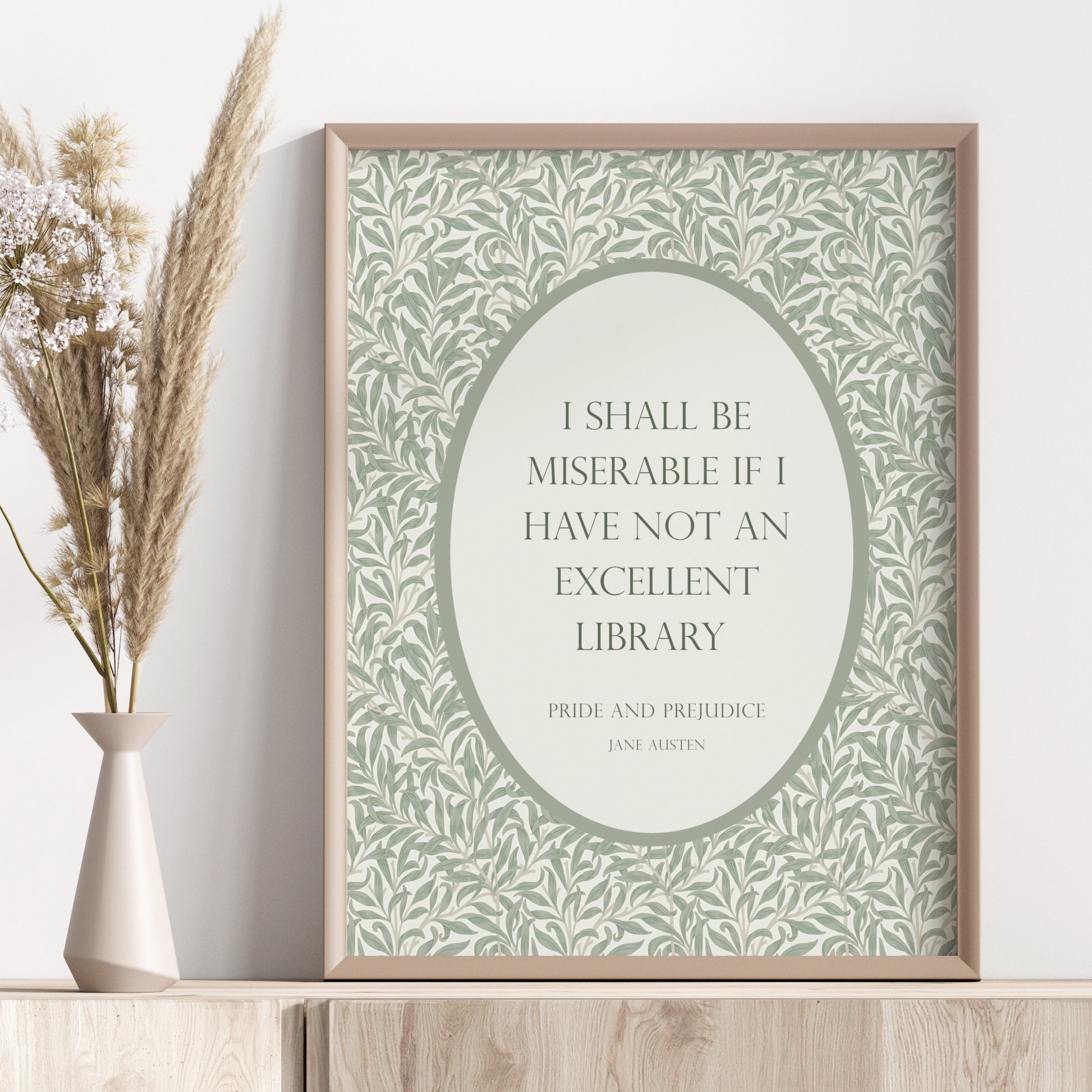 Single portrait typography print featuring a Pride and Prejudice quote. Styling is vintage, with a William Morris print backound (Willow Bough) and text in a formal upper case font, positioned within an bordered oval shape. Palette is a sage green.