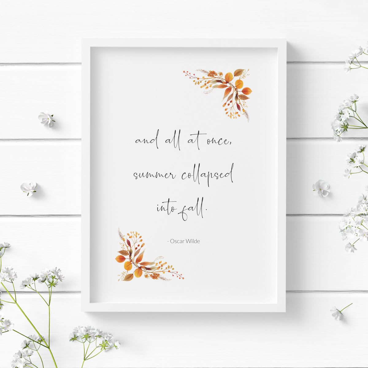 Single portrait print featuring the following quote by Oscar Wilde: and all at once, summer collapsed into fall. The quote is in a contemporary script font, with the attribution in a simple sans serif font. Autumnal foliage complements that quote.