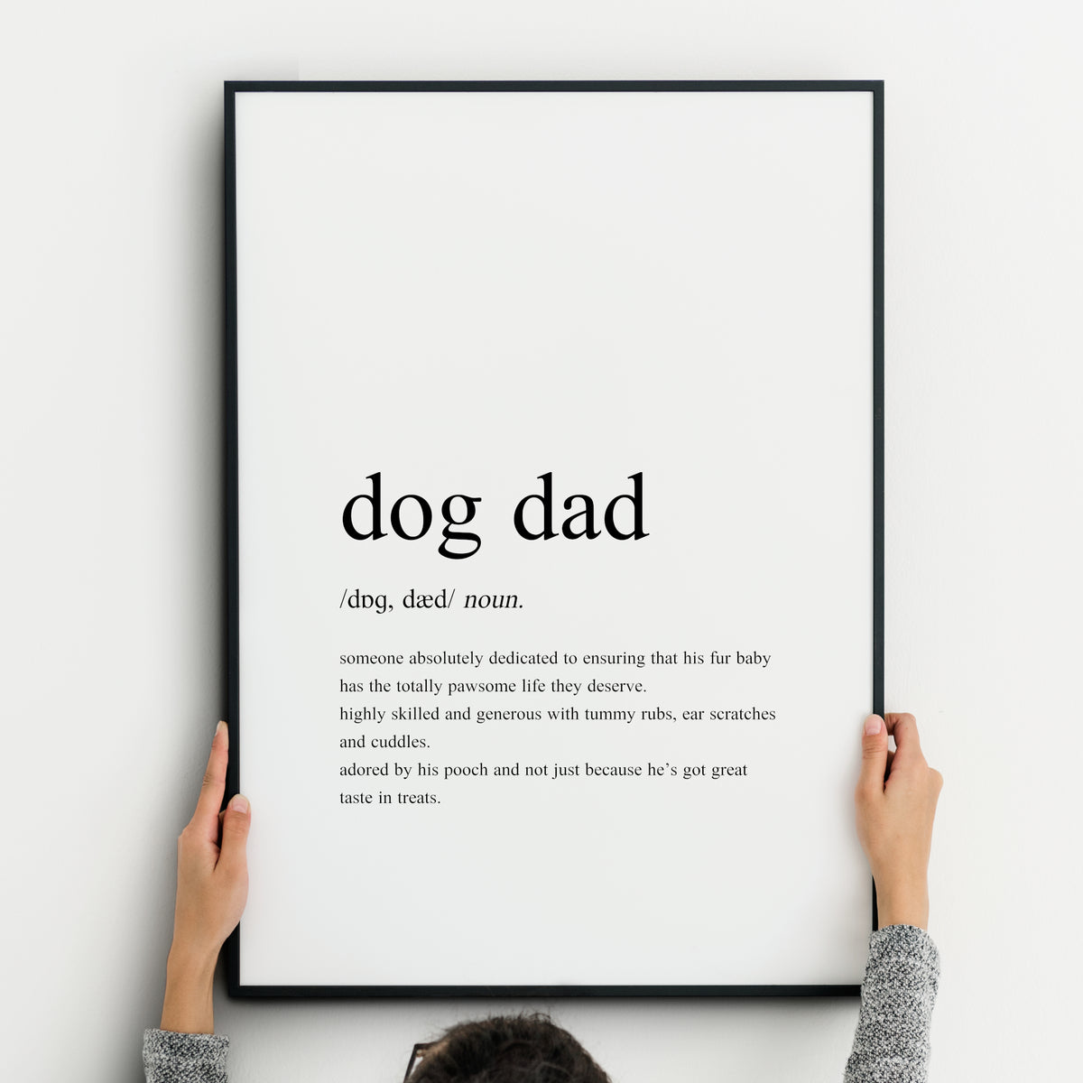 Dog Dad definition typography print. The styling is as per a traditional dictionary definition, with the pronunciation and description of the term included. All text is displayed in lower case.