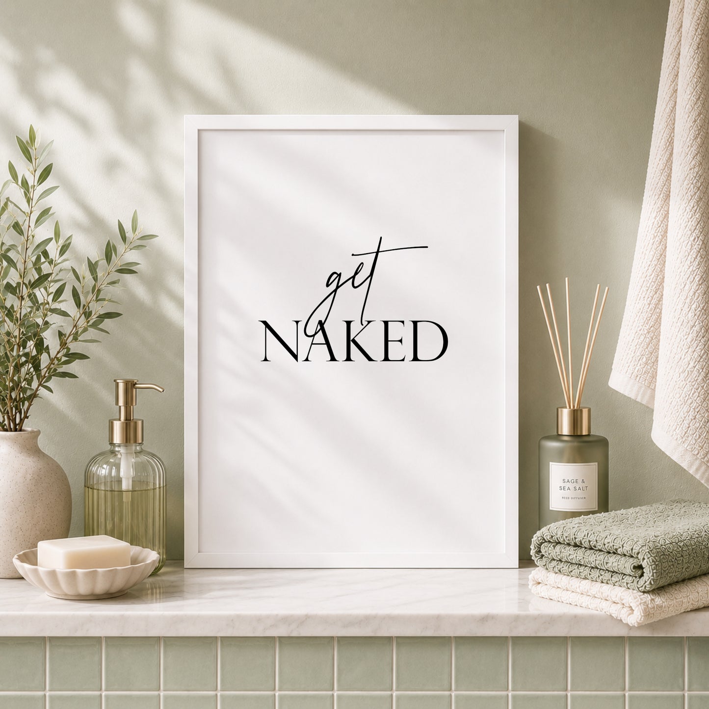 Single portrait typography print. Text reads "get naked". Text is black on a white background and is centre-aligned. Styling is modern and elegant.