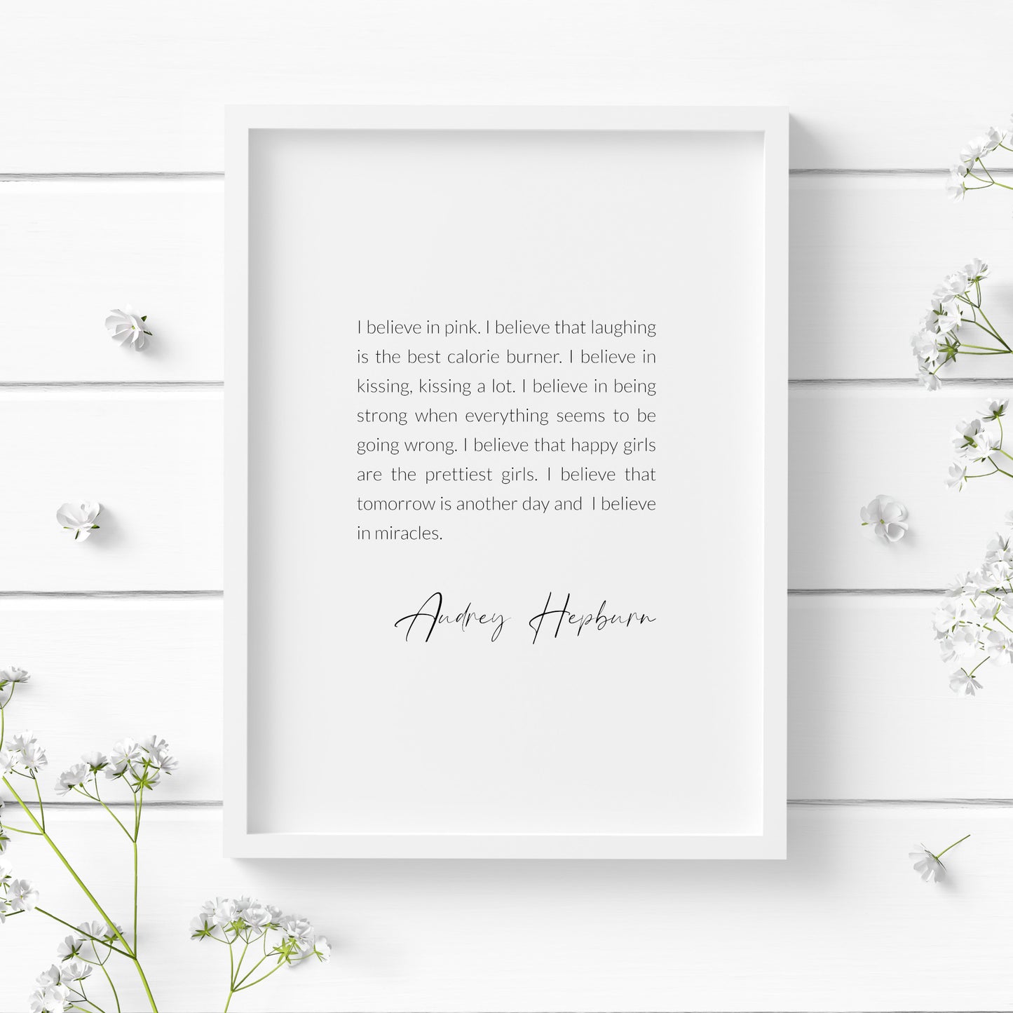 Single portrait typography print featuring an inspirational quote by Audrey Hepburn. Text is black on a white background, in a crisp sans serif font and fully justified. An attribution to Audrey Hepburn is positioned below in an elegant script font.