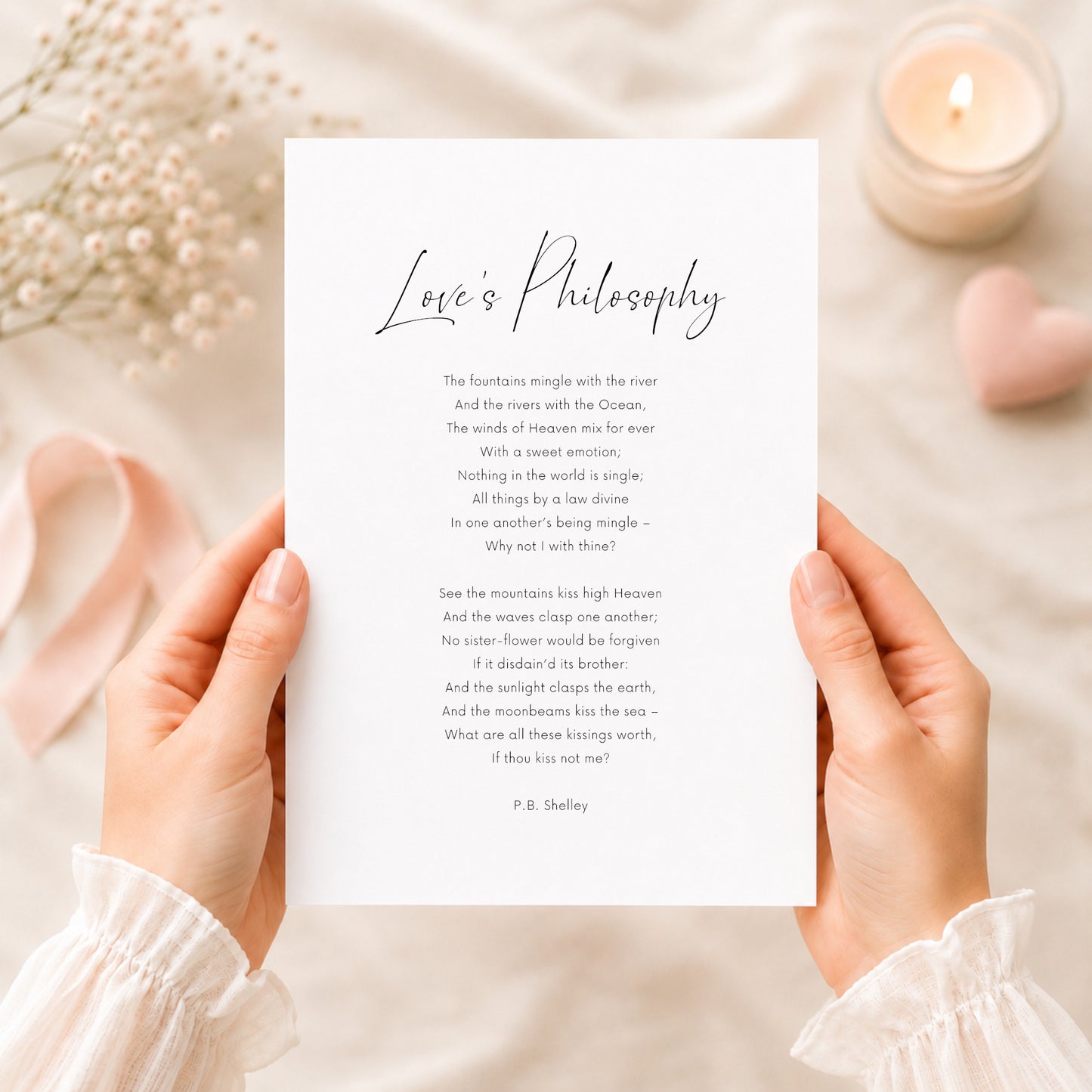 Single portrait typography print featuring the poem Love's Philosophy by P. B. Shelley. The title is displayed in an elegant script font, with the main body and attribution is a clear sans serif font. Text is black on a white background.