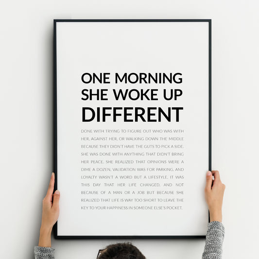 Single portrait typography print. Quote begins "One morning she woke up different". Title and body are in an upper case sans serif font. Title is bold and body lightweight. Text is black on a white background and fully justified.