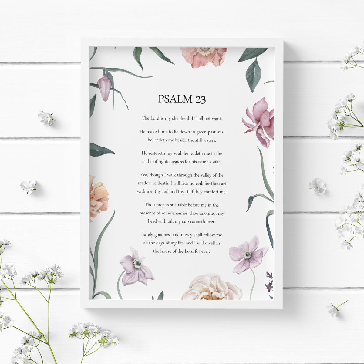 Single portrait print featuring Psalm 23, The Lord Is My Shepherd. Text is in a delicate serif font, centre-aligned, black on a white background. The verse is framed by a delicate watercolour-style illustration of flowers and foliage in soft pink, peach, lilac and green tones.