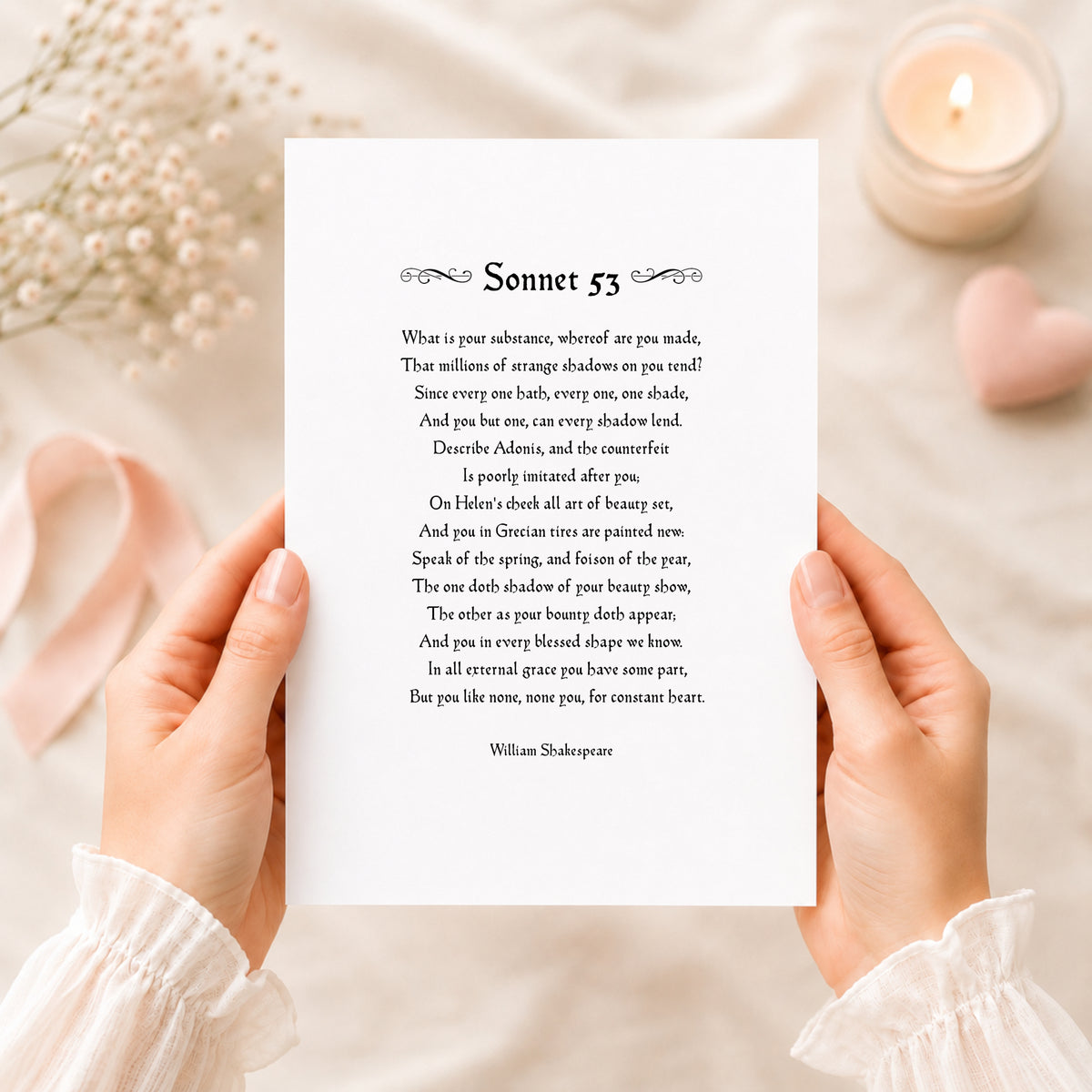 Single portrait typography print of Shakespeare's sonnet 53, which features the iconic quote "But you like none, none you, for constant heart". Text is in a vintage style, black on a white background and centre-aligned. Ornamental flourishes frame the title left and right.