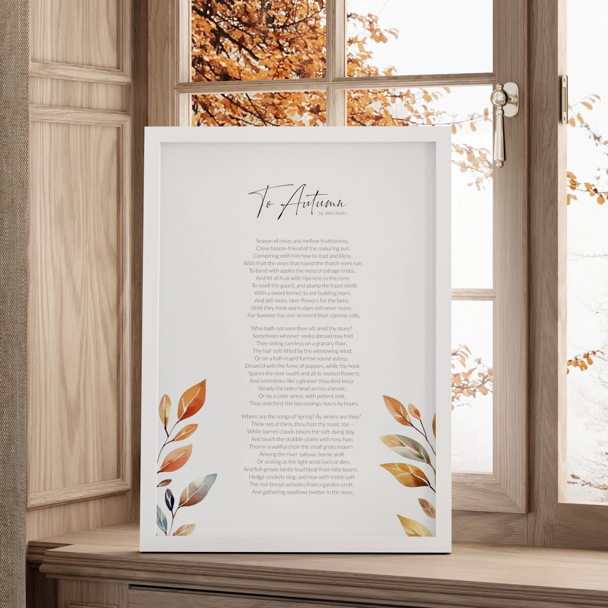 Single portrait print featuring the poem To Autumn by John Keats. The title is in a modern script font with the body text is a lightweight sans serif font. All text is black on a white background and centre-aligned. The print is embellished with a watercolour illustration of autumn leaves, which frame the poem to the bottom left and right. Styling is modern and elegant.