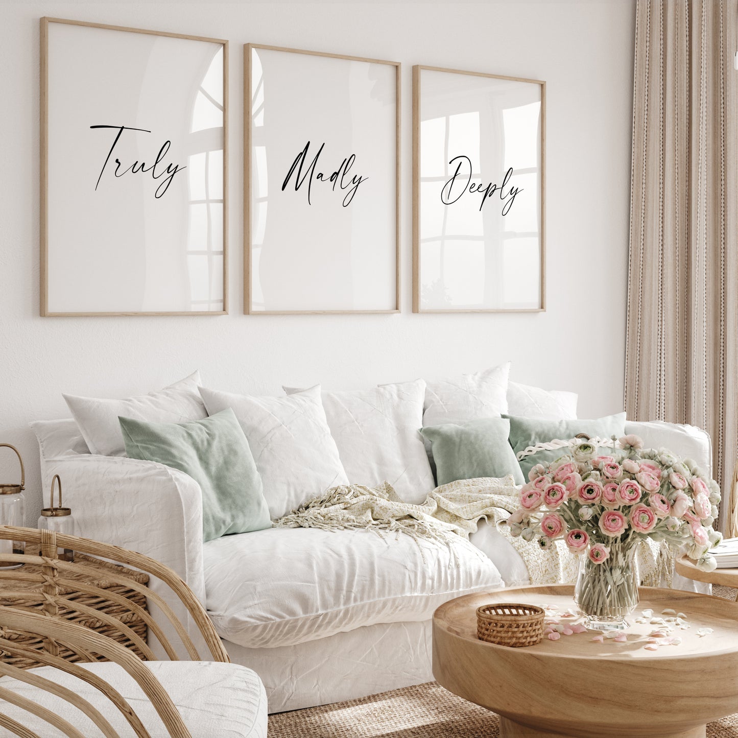 Set of 3 portrait typography prints positioned side by side. Text across the 3 reads: Truly Madly Deeply. All text is in a striking script font, black on a white background.