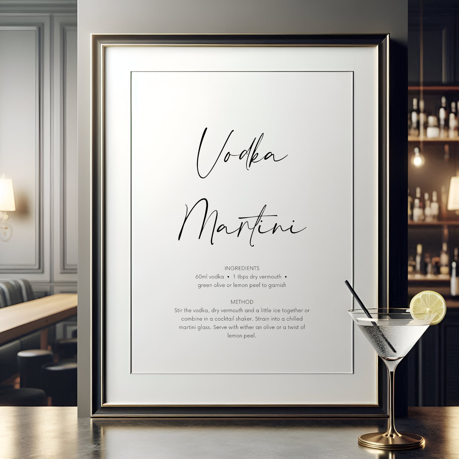 Single portrait typography print of the recipe for a vodka martini cocktail. The name of the drink is positioned prominently in a script font, with the ingredients and instructions  shown in a clear font below. Text is black on a white background.