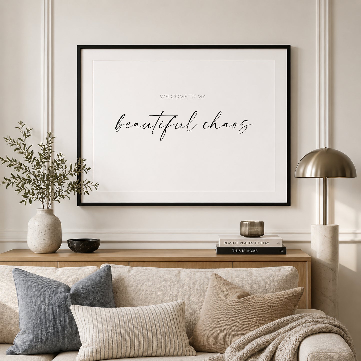 Single landscape typography print. Text reads: Welcome to my beautiful chaos. The words beautiful chaos are positioned prominently in an elegant script font. Remaining text is in a small sans serif font. Text is black on a white background.