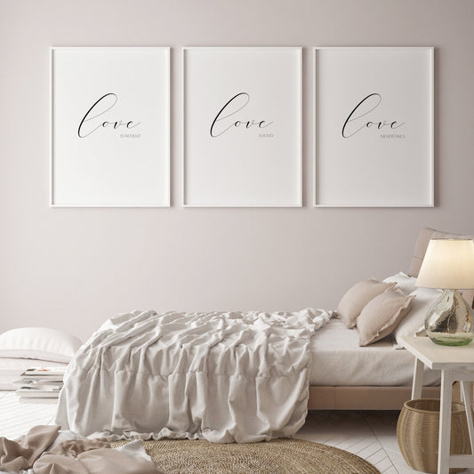Set of 3 prints displayed in black portrait frames. The 1st reads love is patient, the 2nd love is kind and the 3rd love never fails. In each, the word love is in a large script font, with the other text in a sans serif font below and right-aligned.